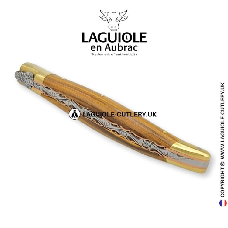 brass blossom: laguiole knife in pistachio wood – sculpted bee – brass bolsters and copper plates