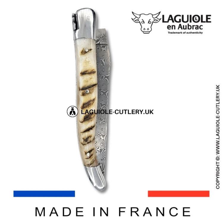 laguiole pocket knife double plates in ram horn with damascus blade