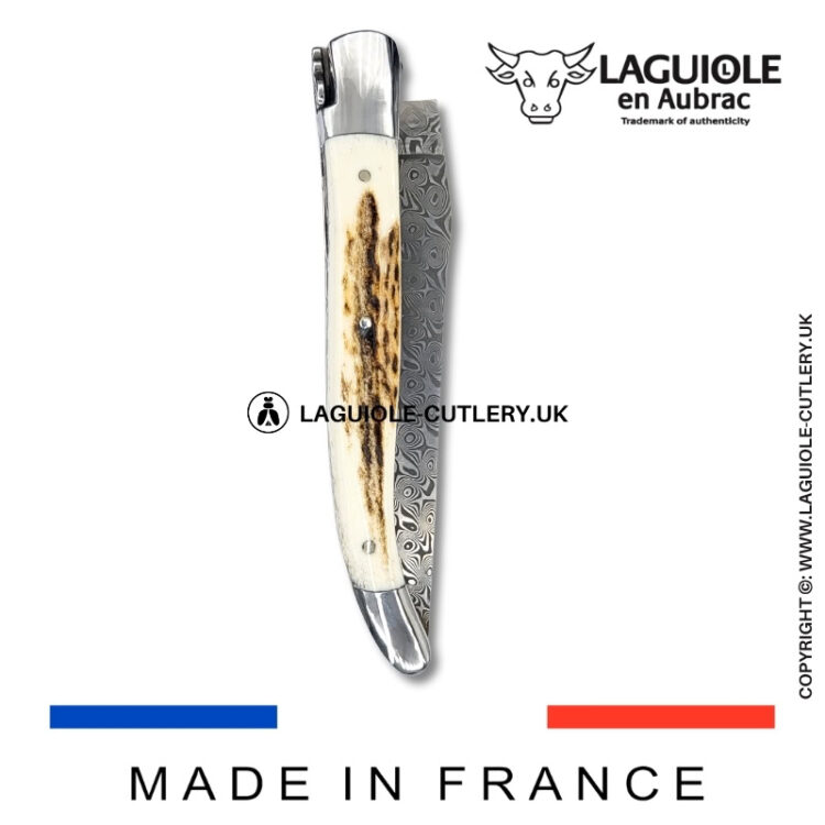 laguiole pocket knife double plates in stag horn with damascus blade