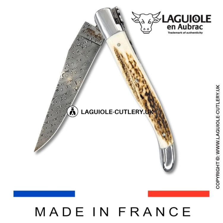 laguiole pocket knife double plates in stag horn with damascus blade