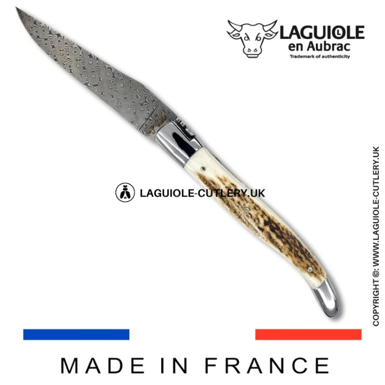 laguiole pocket knife double plates in stag horn with damascus blade