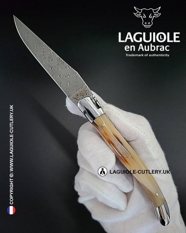 laguiole pocket knife in horn tip with damascus blade & hand engraved plates