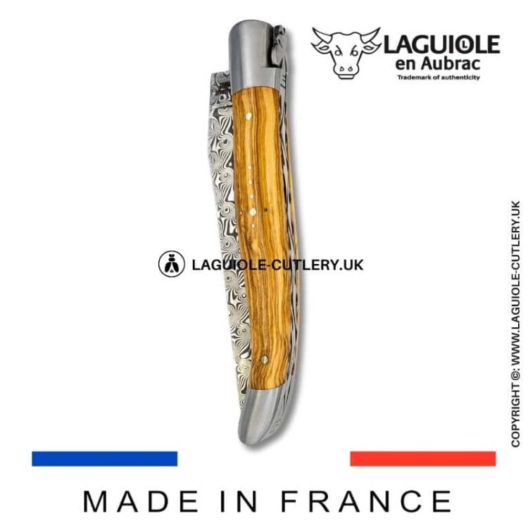 laguiole pocket knife in olivewood with damascus blade & hand engraved plates