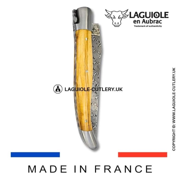 laguiole pocket knife in olivewood with damascus blade & hand engraved plates