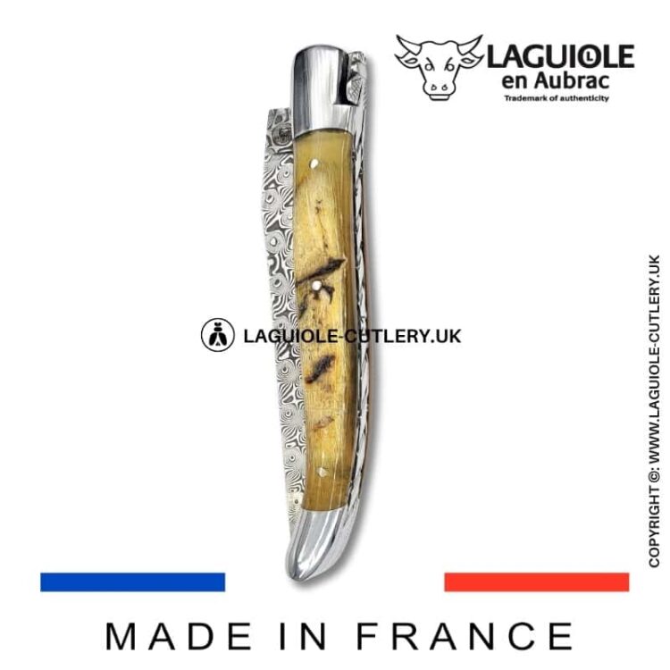 laguiole pocket knife in ram horn with damascus blade & hand engraved plates