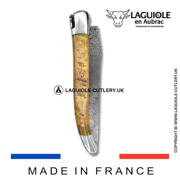 laguiole pocket knife in ram horn with damascus blade & hand engraved plates