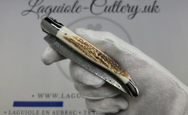 laguiole pocket knife double plates in stag horn with damascus blade